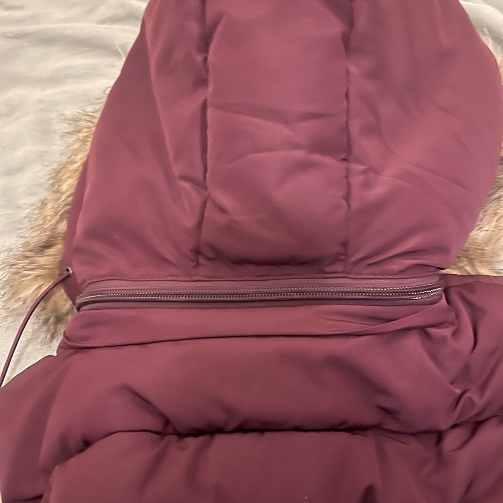 Deep purple vest with removable fur lined hood. Super soft and comfy!